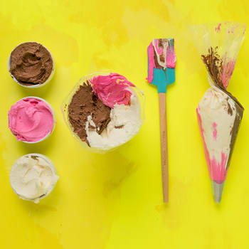 Assorted Frosting Tools on a Yellow Table Assorted Frosting Tools on a Yellow Table