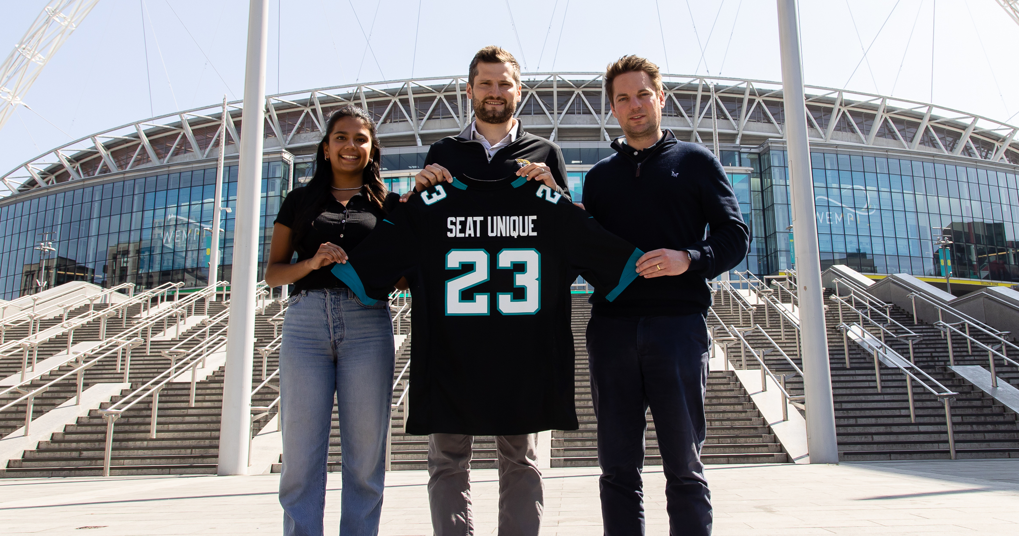 Davina Dempsey and Matt Judge from Seat Unique with Jacksonville Jaguars UK Head of Commercial