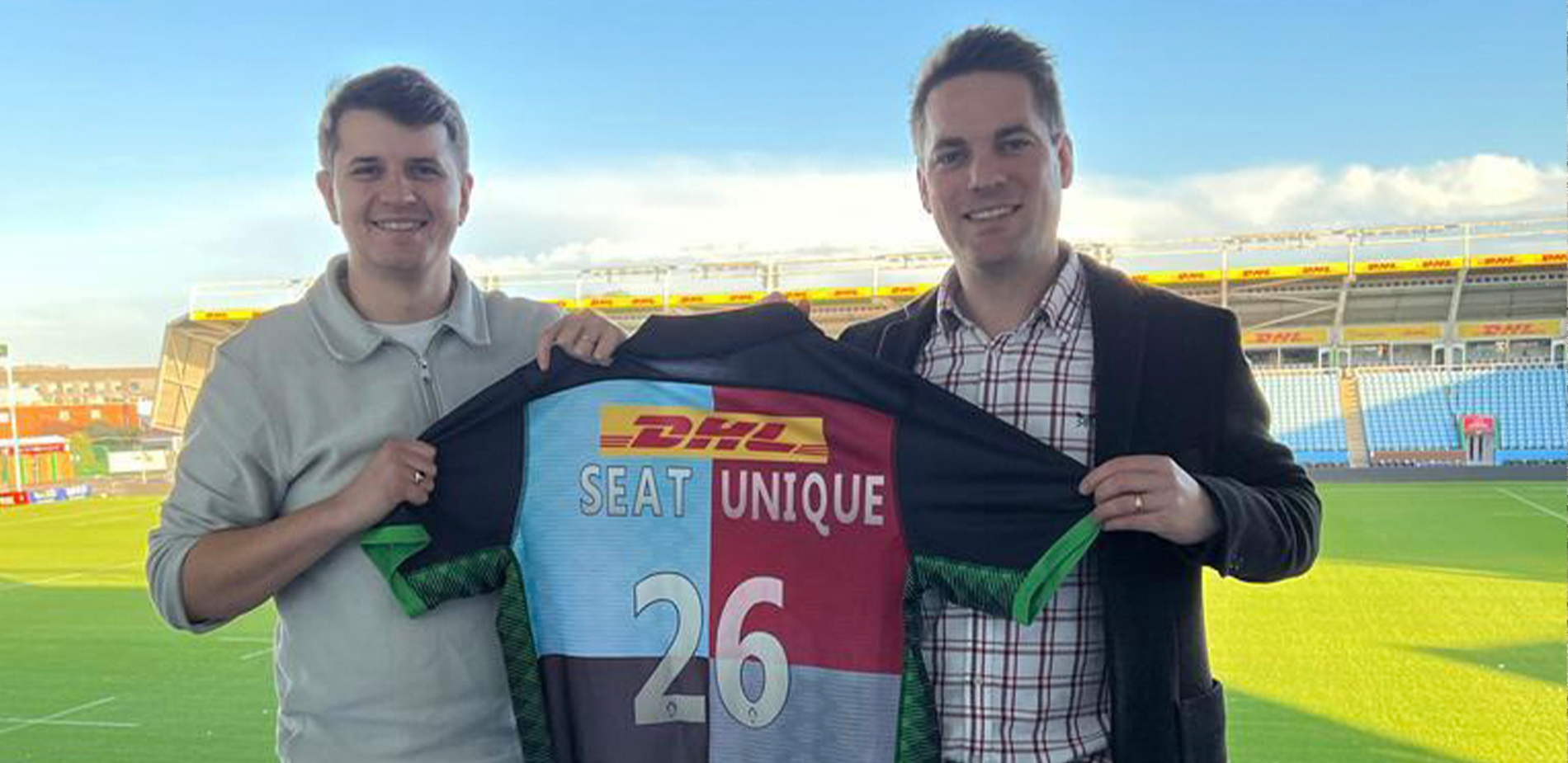 Joe Yates-Round and Matt Judge holding Harlequins rugby shirt