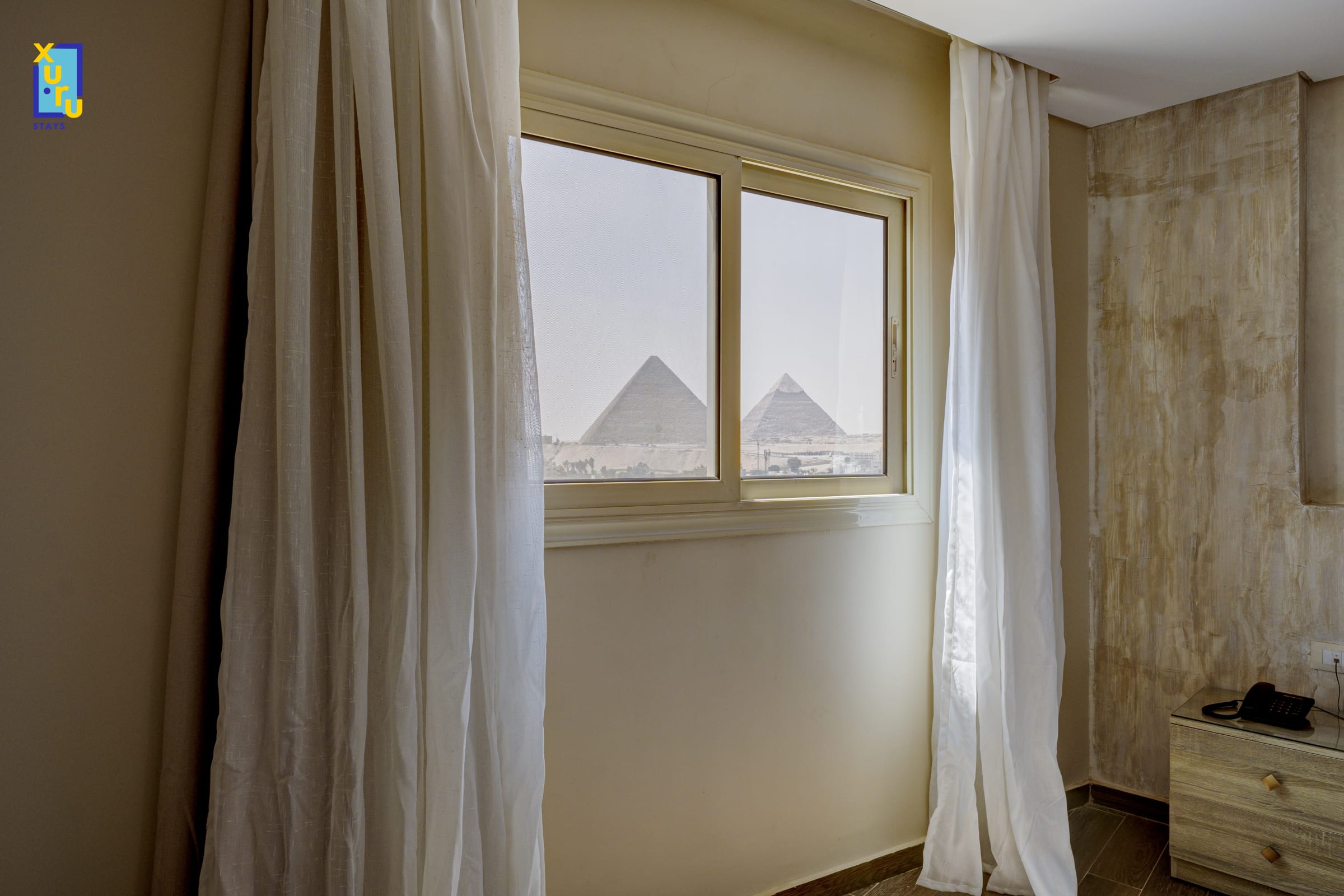 The Pyramids Global Suites W/ Stunning Rooftop Views — Unit in 5 King Faisal St, Kafr Nassar, Al Haram, Giza Governorate 3524020, Giza, Egypt — photo 2
