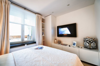Bedroom with Queen Sized Bed / Smart TV