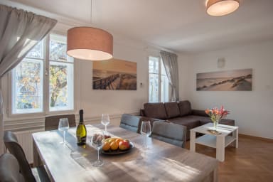 Wonderful living room and dining table with romantic details