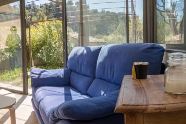 Veranda with sitting area and TV