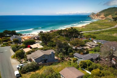 Private beach house overlooking the ocean, beach and mountain.