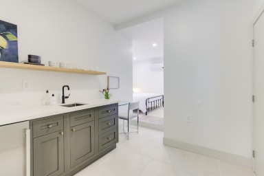 Kitchenette with Nespresso coffee machine, microwave & mini fridge