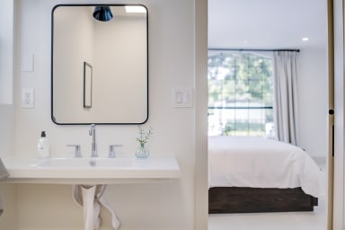 A private bath with a rain shower