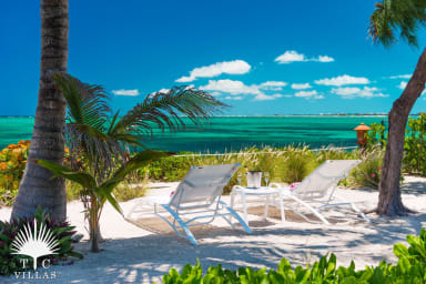 Reef Pearl's beachfront lounging area.
