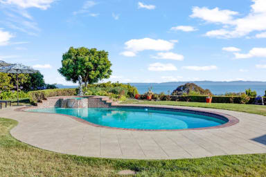 Resort-style circular pool as the centerpiece of the backyard