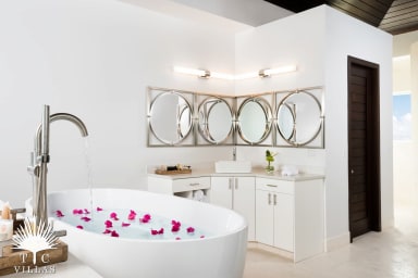 Sandcastle's master bedroom with ensuite bath and soaking tub.