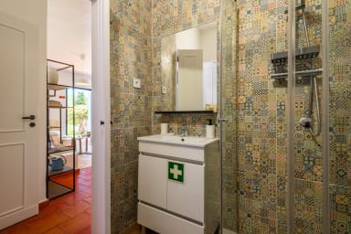 Bathroom 1 in guest annex with shower, toilet and sink