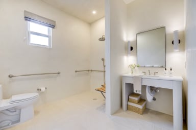 En-suite bathroom with rain shower and high-end toiletries