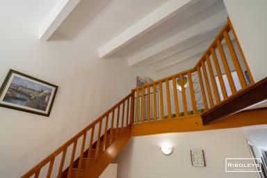 Mezzanine ouverte sur la pièce de vie