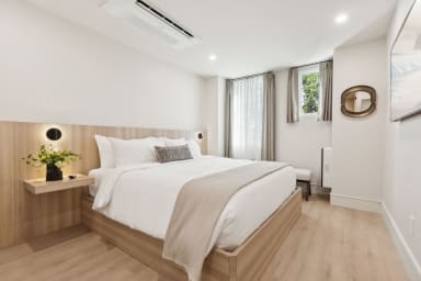 Second bedroom with a king bed & 55