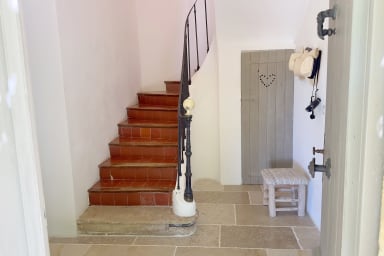 The staircase leading to the upstairs bedrooms