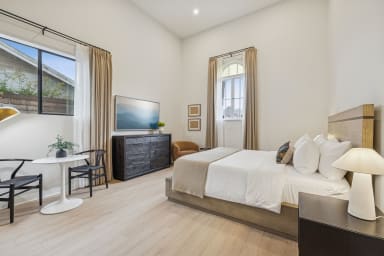 California King bed, sleeps 2, seating area, smart TV