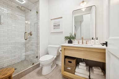 En-suite bathroom with rain shower and high-end toiletries