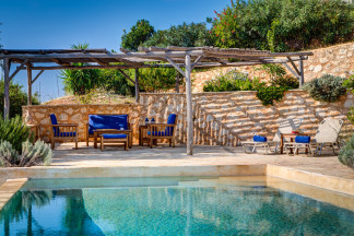 Outside living area beside the pool ideal for relaxing