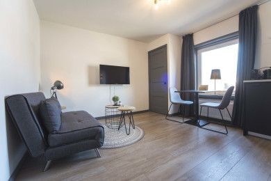 Private living room with HD Cable flat screen and nice couch