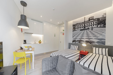 Bedroom with two single bed , dining room and kitchen