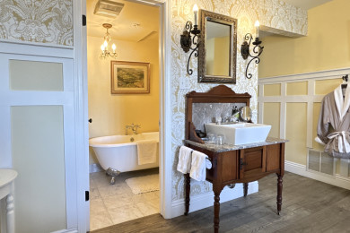 En-suite bathroom with rain shower and high-end toiletries