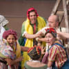 The company as Washerwomen and Daniel Goode as Toad
