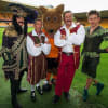 The Chuckle Brothers, John Altman and Ross Carpenter with Wolves’ club mascot Wolfie at Molineux Stadium
