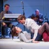 Clare Dunne as Helena and John Lightbody as Lysander, rear Chris Branch and Ed Gaughan
