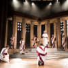 Andrew Woodall as Julius Caesar and the company