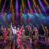 George Ioannides as Emilio Estefan, Christie Prades as Gloria Estefan and the company