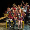 The Brassed Off company on the bus