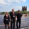 Andy Patterson, Sam Salisbury and Charlotte Atkinson of Storyhouse on the roof with the new solar panels