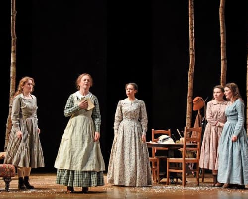 Cillian Lenaghan as Laurie with the March family