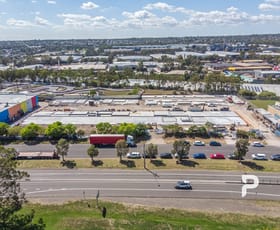 Factory, Warehouse & Industrial commercial property for sale at 10-14 Swettenham Road Minto NSW 2566