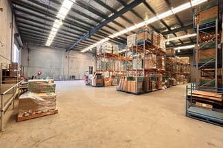 Factory, Warehouse & Industrial commercial property leased at 4 MERRYVALE ROAD Minto NSW 2566