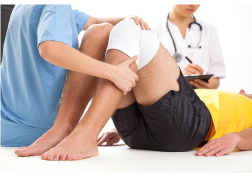 Physiotherapist treating a knee