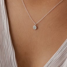 Hopea Sunshine Pendant Necklace: Small Sunshine Pendant Necklace This delicate pendant necklace is hand stamped with the sun