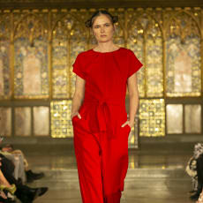Red Wide Leg Red Jumpsuit: Wide-leg red jumpsuit designed to look extraordinary on a diversity of women's figures.