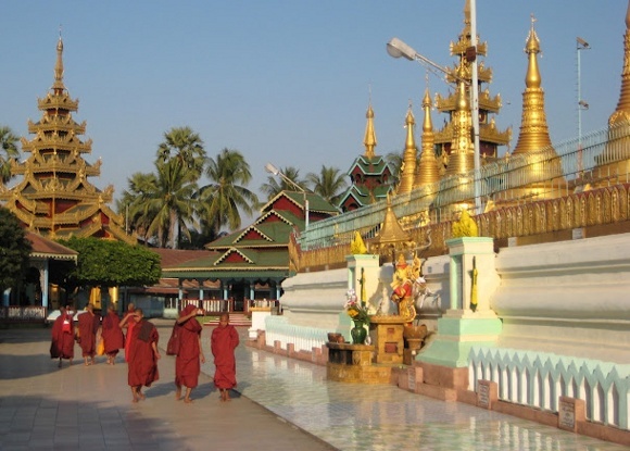 Buddhist monks walking around a Buddhist temple