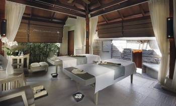 a room filled with furniture and a large window