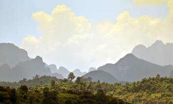 a large mountain in the background