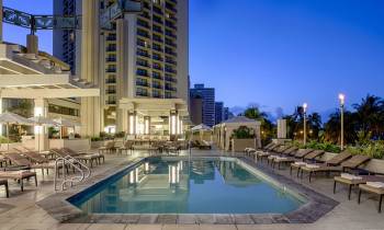 a pool next to a building
