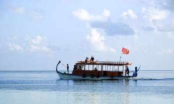 a small boat in a body of water