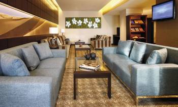 a living room with a leather chair