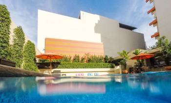 a large pool of water in front of a building