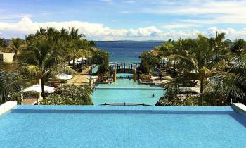 a pool next to a body of water
