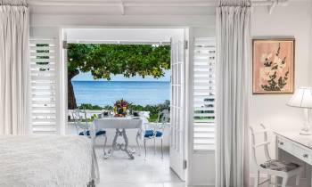 white furniture in front of a window