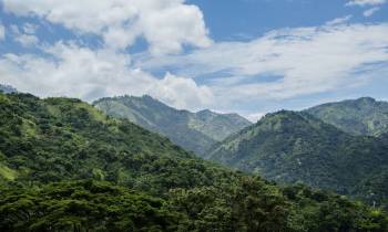 a view of a large mountain in the background
