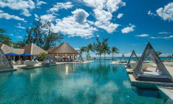 a pool next to a body of water