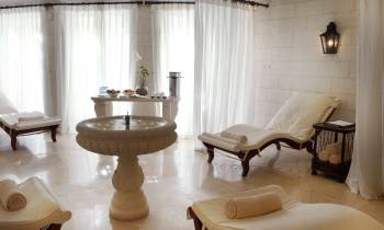 a room filled with furniture and a large window