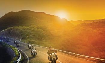 Motorcycle ride at sunset